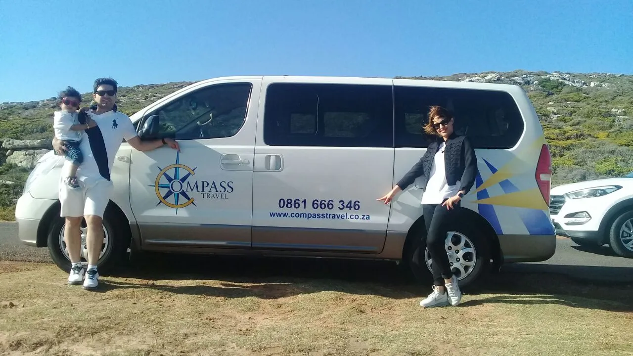 Compass Travel branded vehicles at a Cape Town venue
