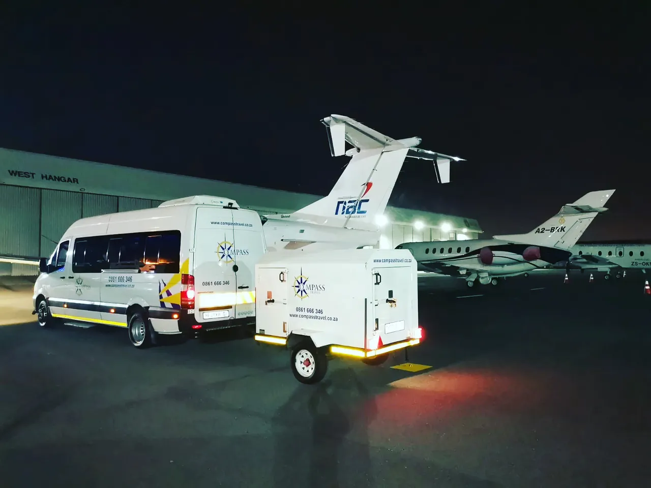 Compass Travel branded vehicles at a Cape Town venue